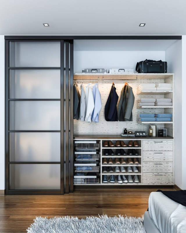 Closet System with Frosted Glass Sliding Doors and Whitewashed Finish