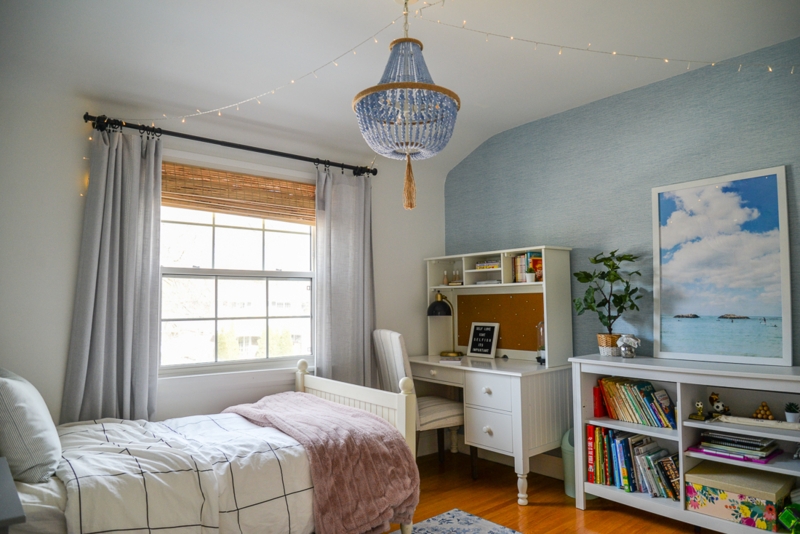Coastal Bedroom with Blue Beaded Chandelier and Textured Accent Wall