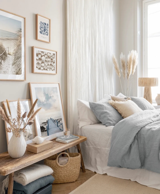 Coastal Bedroom with Rustic Wooden Bench and Serene Gallery Wall