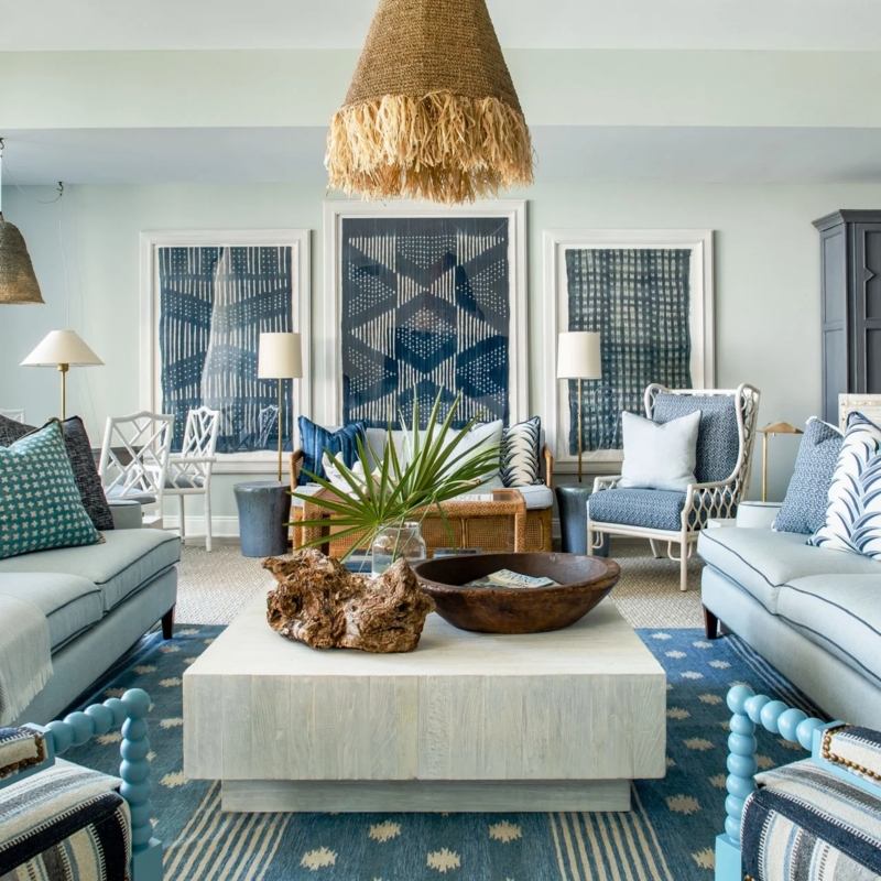 Coastal Blue Sofa with Fringed Raffia Pendant and Symmetrical Layout