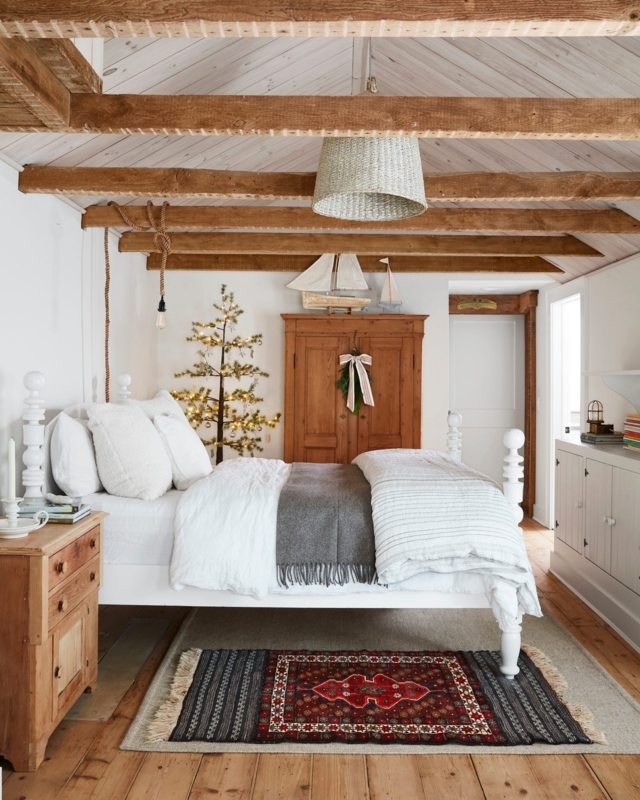 Coastal Cottage Bedroom: Whitewashed Ceiling and Unique Rope Lighting