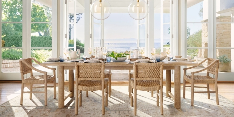 Coastal Dining Room with Ocean View & Woven Armchairs
