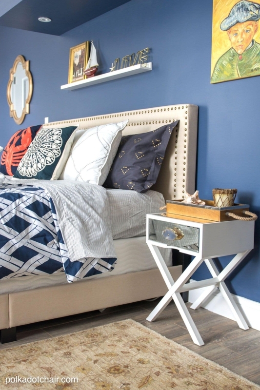 Coastal Upholstered Bed with Nailhead Trim and Mirrored Nightstand
