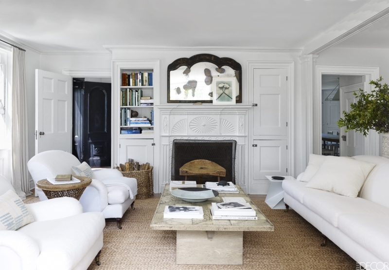 Coastal White Sofa Living Room with Textured Jute Rug and Stone Table