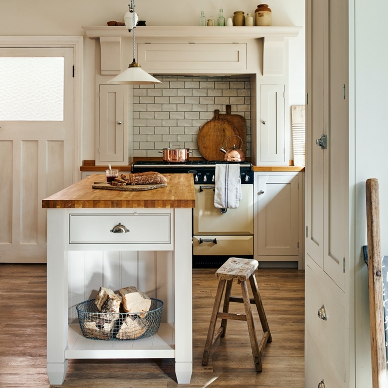 Compact Dark Blue Kitchen Island with Butcher Block and Slatted Shelf