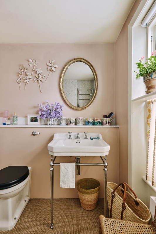 Console Sink with Chrome Legs in a Blush Pink Small Powder Room