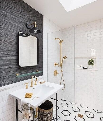 Console Sink with Textured Grey Accent Wall & Gold Fixtures