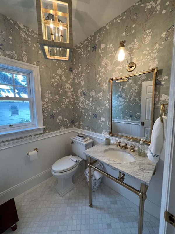 Console Vanity with Brass Legs and Sage Green Floral Bird Wallpaper