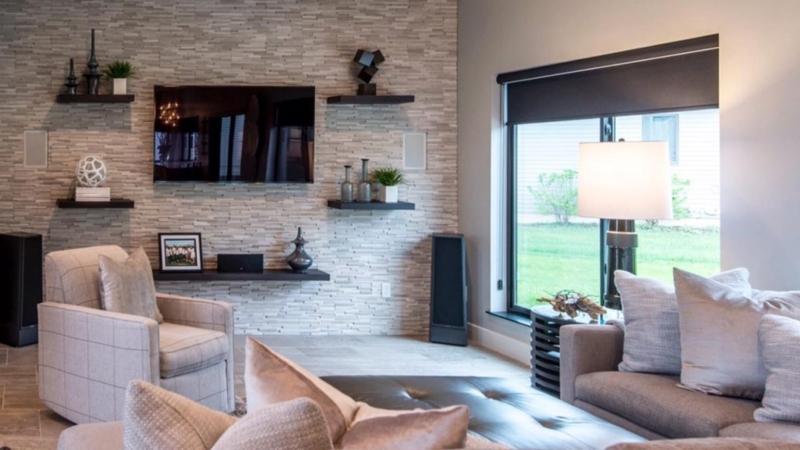 Contemporary Living Room with Stacked Stone Media Wall and Tonal Texture
