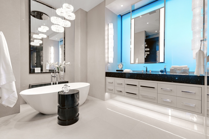 Contemporary Luxury Bathroom with Vibrant Blue Backlighting Feature
