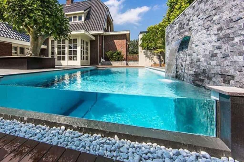 Contemporary Raised Pool with Transparent Glass Wall
