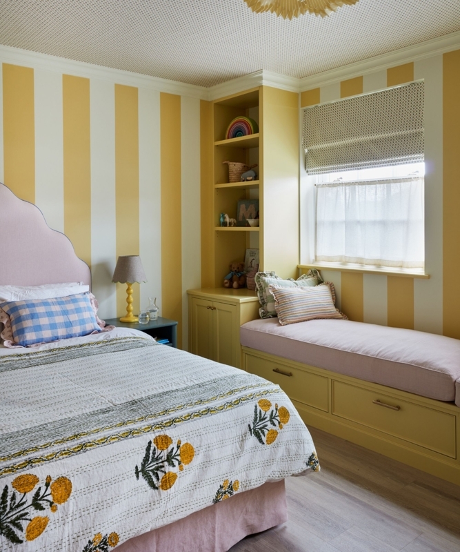 Cottage Bedroom with Striped Wallpaper and Scalloped Pink Headboard