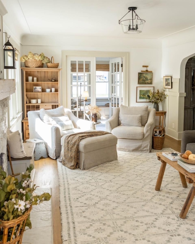 Cottage Living Room with Large Geometric Area Rug & Rustic Bookcase