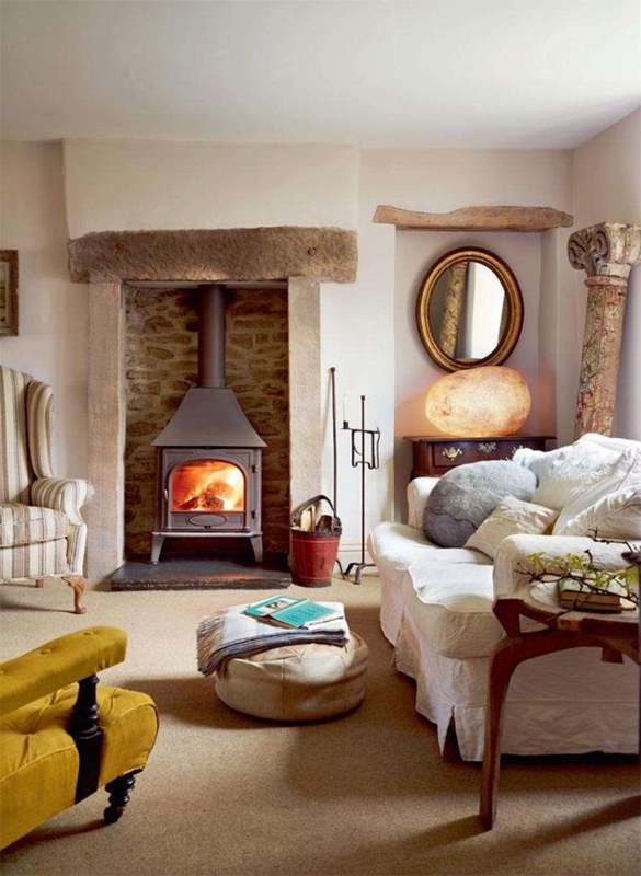 Cottage Living Room with White Slipcovered Sofa and Stone Niche