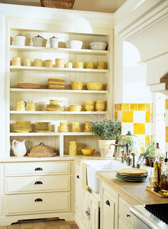 Cottage Style Kitchen with Yellow Dishware and Checkered Tile Backsplash