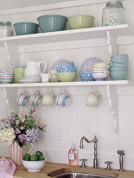 Cottage Wall Shelves with Scrolled Brackets and Pastel Dishware