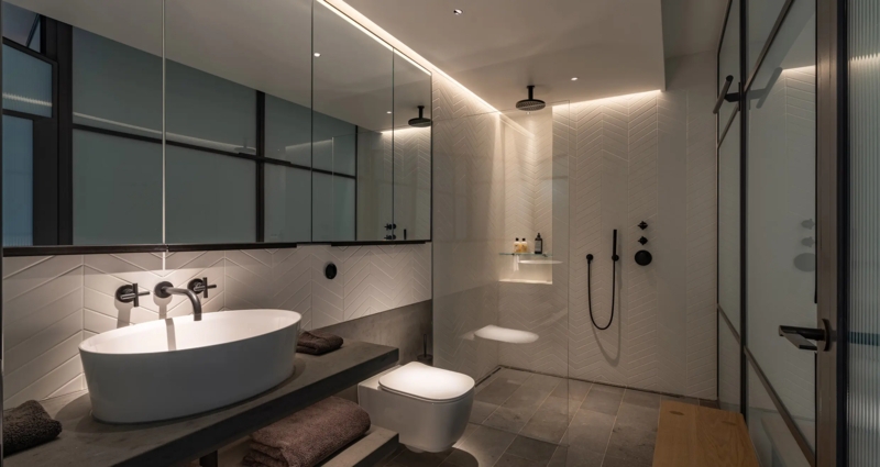 Cove Lighting: Minimalist Bathroom with Chevron Tile Wall