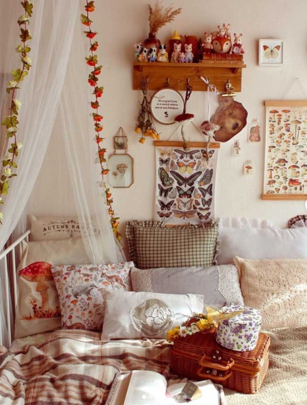 Cozy Bed Nook with Sheer Canopy Vines and Whimsical Mushroom Wall Decor