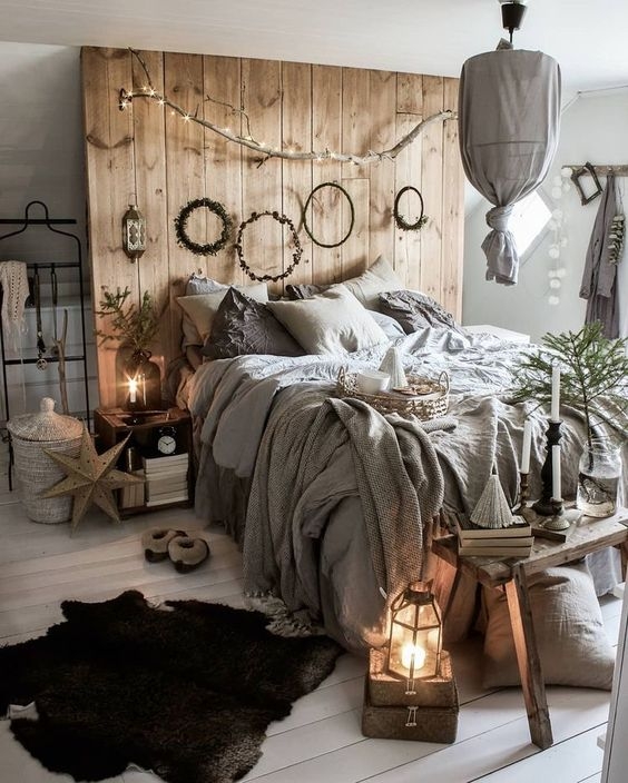 Cozy Bedroom With String Lights Natural Branch Decor And Wood Plank Wall