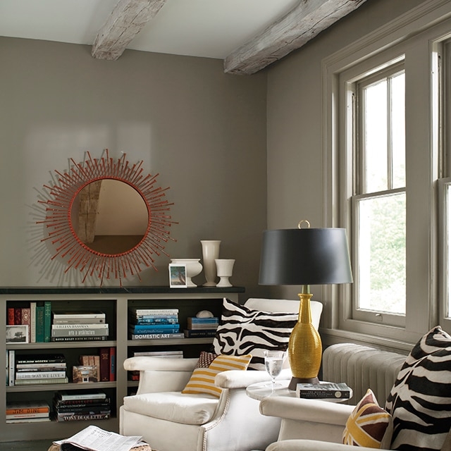 Cozy Reading Nook with Exposed Ceiling Beams and Taupe Walls