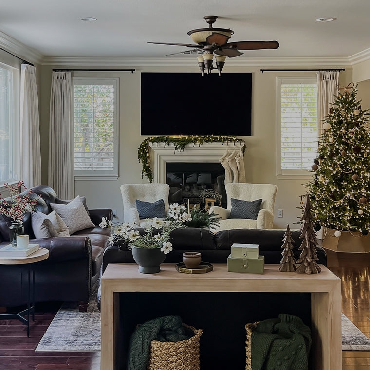Cozy Traditional White Curtains with Dark Leather and Sherpa Chairs