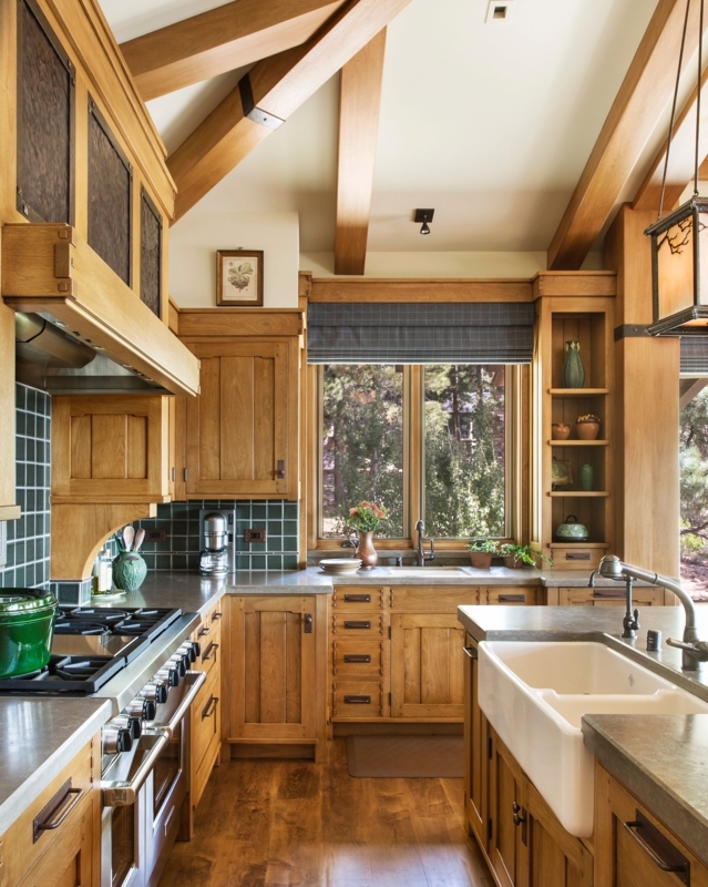 Craftsman Style Kitchen with Vaulted Ceiling Beams and Green Tile Backsplash
