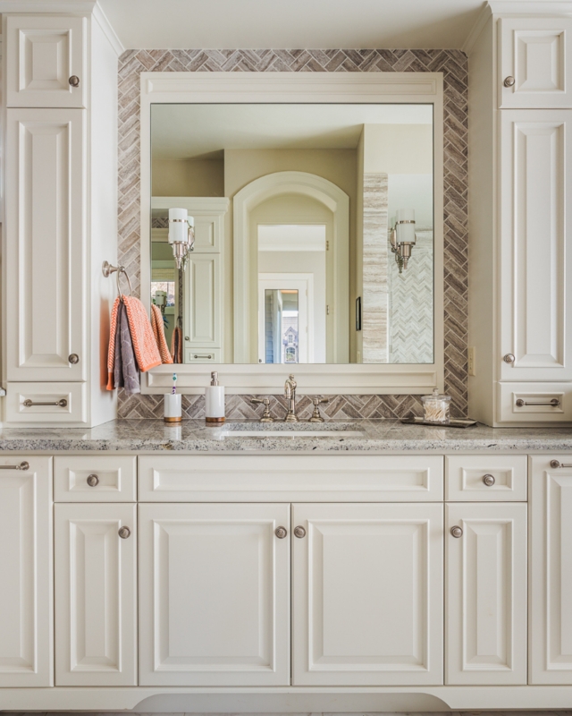 Cream Bathroom Vanity with Storage Towers & Herringbone Tile