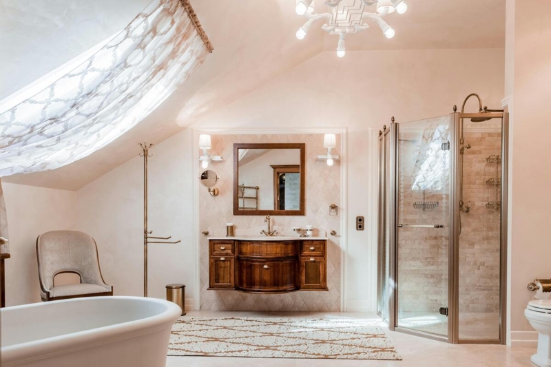 Curved Wood Vanity: Sloped Ceiling Bathroom Design with Drapery