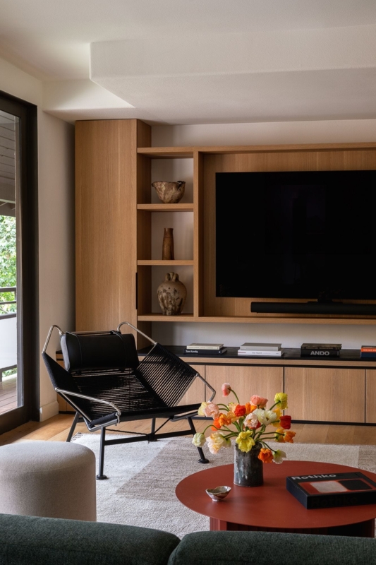Custom Wood Built-in TV Wall with Terracotta Accent Table