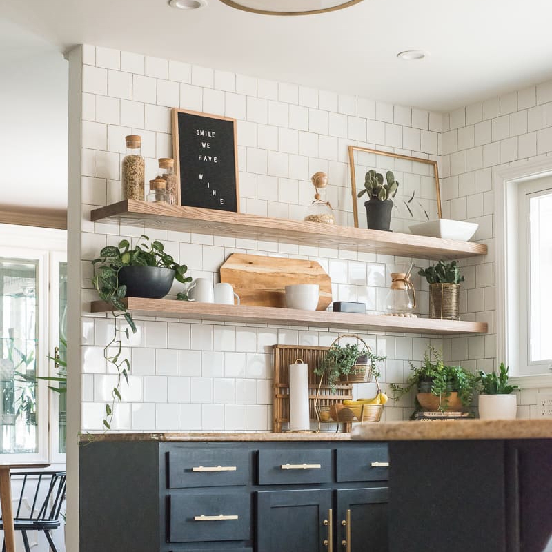 Dark Blue Shaker Cabinets with Square Tile Backsplash and Shelves