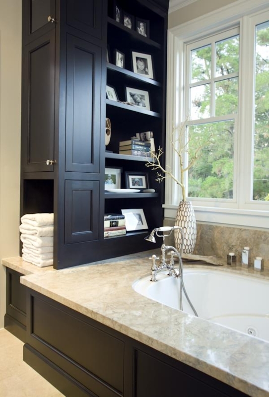 Dark Cabinetry Bathroom Storage: Built-in Shelving & Drop-in Tub