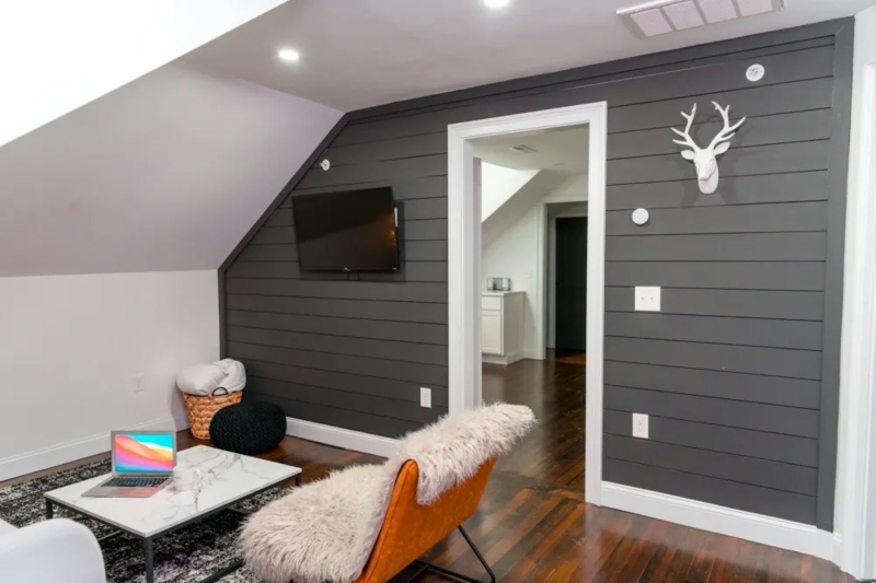 Dark Charcoal Shiplap Wall Paneling with Sloped Ceiling