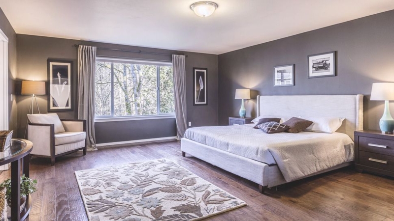 Dark Charcoal Walls and Botanical Pattern Area Rug