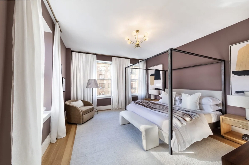 Dark Metal Canopy Bed in Transitional Bedroom with Mauve Walls