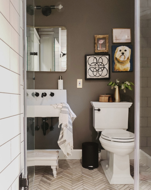Dark Taupe Bathroom Wall Paint, Herringbone Floor, and Wall Hung Sink