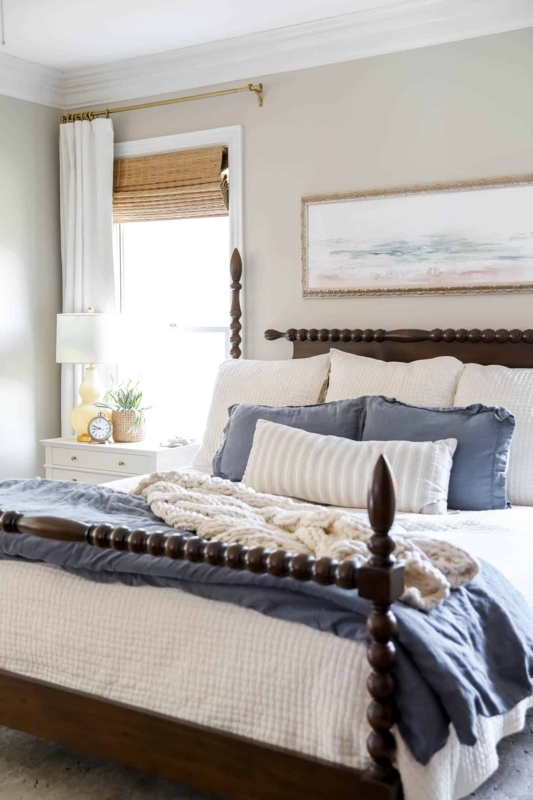 Dark Wood Bobbin Bed Frame with Layered Blue Bedding