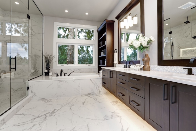 Dark Wood Double Vanity Design in Transitional Master Bath with Marble