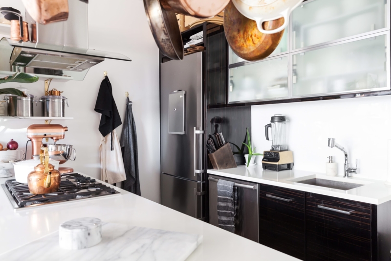 Dark Wood Kitchen Cabinet Layout with Glass Front Upper Cabinets