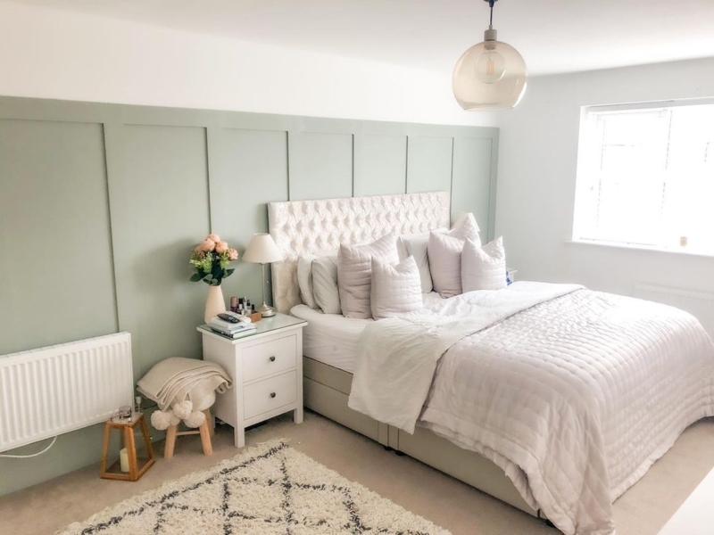Diamond Tufted Upholstered Bed against Sage Green Wall Paneling