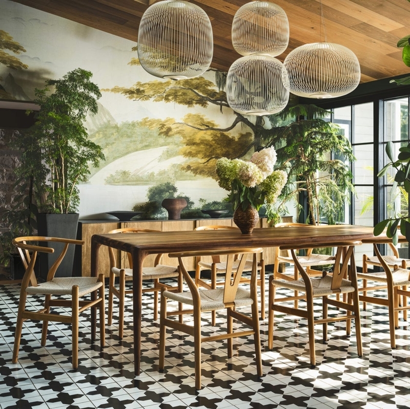 Dining Room with Landscape Mural and Oversized Wire Pendant Lights