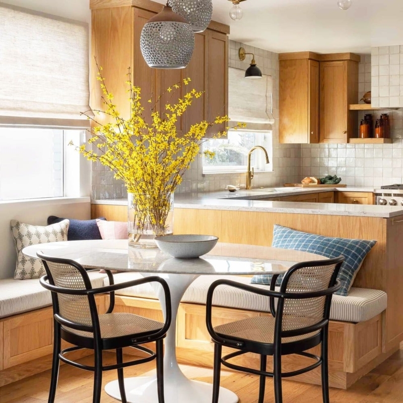 Dining Table: Round Pedestal for Breakfast Nook with Black Cane Chairs