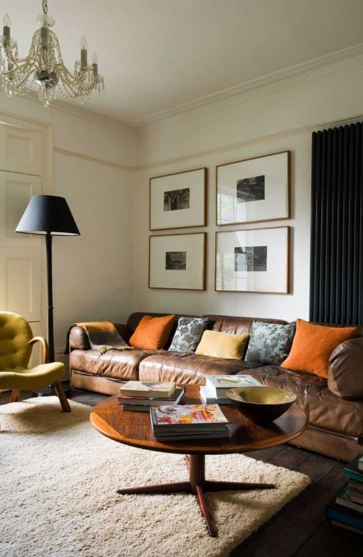 Distressed Leather Sofa in Transitional Living Room with Gallery Wall