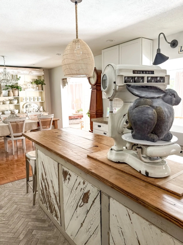 Distressed White Kitchen Island Styling with Vintage Scale