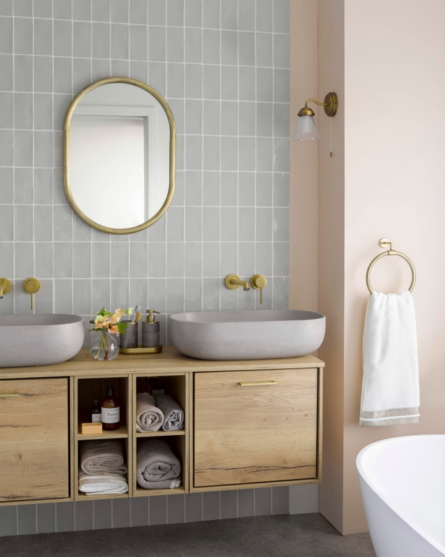 Double Bathroom Vanity with Grey Vessel Sinks and Blush Pink Wall Accents