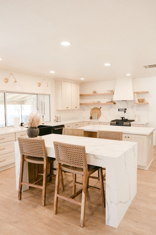 Double Kitchen Island Layout with Woven Bar Stools and Marble