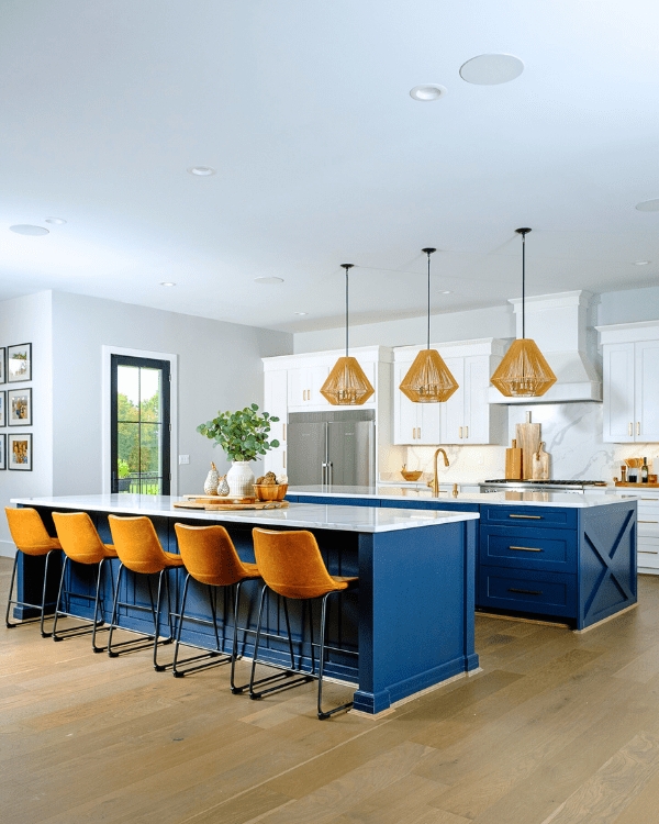 Double Navy Blue Kitchen Islands with Orange Stools