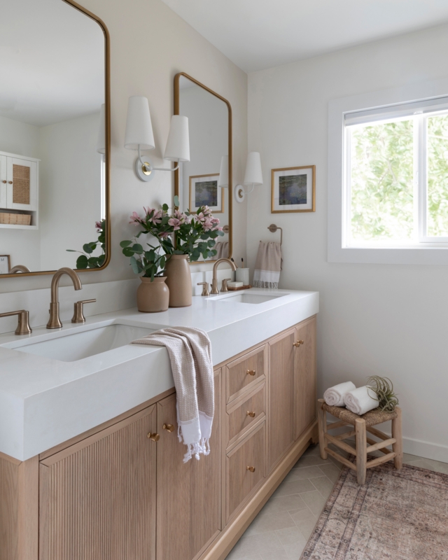 Double Vanity, Fluted Cabinets, Arched Mirrors, Organic Bathroom Design