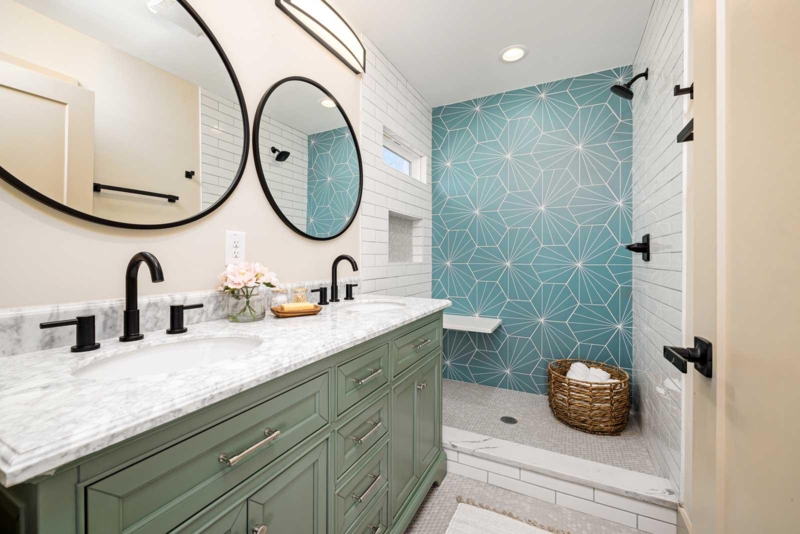 Double Vanity with Sage Green Cabinets & Geometric Accent Wall