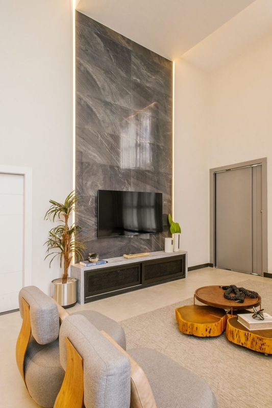 Dramatic Stone Focal Wall with Backlit LED & Organic Tables