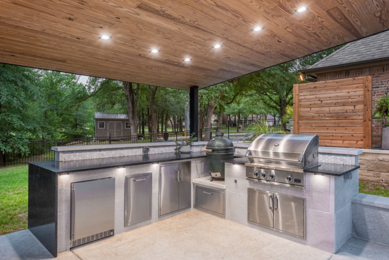 Dual Grill Outdoor Cooking Station with Wood Paneled Ceiling